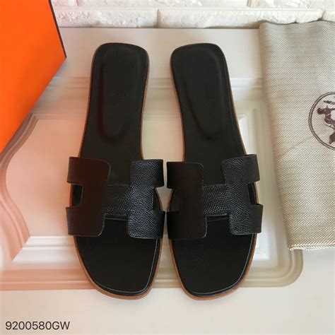 black hermes slides|hermes look alike sandals.